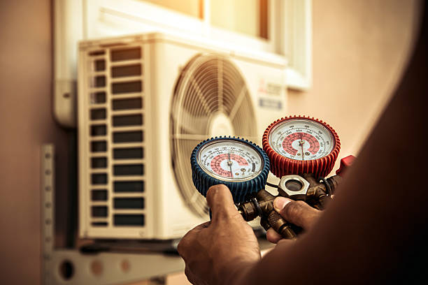 Professional Ductwork Repair technician working in Whitinsville, MA
